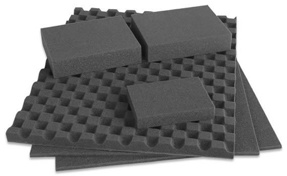 AcoustiPack Deluxe (v2) - pictured here featuring the AcoustiContour low-reflection anechoic surface (shown on the uppermost large sheet of acoustic composite). The Deluxe pack also contains additional acoustic foam blocks (shown here on top) for fitting inside appropriate empty drive bays - where they help to absorb further noise and to reduce the internal air space volume inside a case. The pack also includes two generously sized sheets of our unique acoustic composite material. In combination these materials will result in a significant lowering of computer noise - even in larger computer cases.