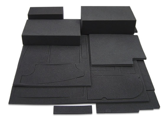 View of the pre-shaped soundproofing kit for tthe Antec Sonata II. The image shows foam blocks in the background. There are 18 parts to this kit in total. Some parts require pressing out before fitting.